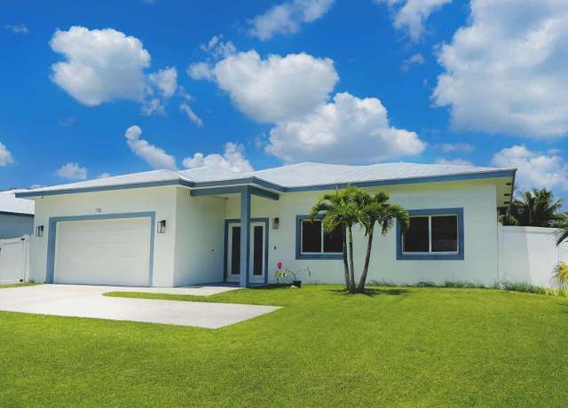 Property at 115 SW Oakridge Dr, Port Saint Lucie, FL 34984, 4 beds, 3 baths