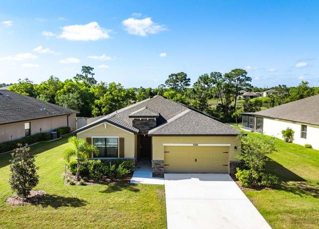 Property at 6056 NW Regent St, Port Saint Lucie, FL 34983, 4 beds, 2 baths