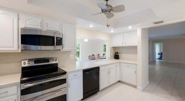 Photo of 732 Muirfield Cir, Atlantis, FL 33462