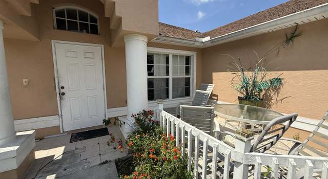 Photo of 416 SE Calmoso Dr, Port Saint Lucie, FL 34983