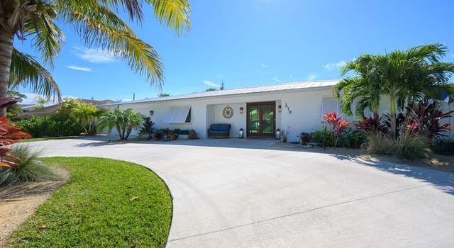 Photo of 319 Country Club Dr, Tequesta, FL 33469