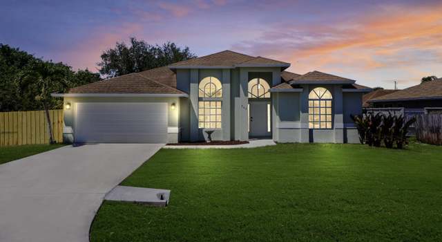Photo of 565 SW Halkell Ave, Port Saint Lucie, FL 34953