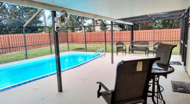 Photo of 1514 SE Manth Ln, Port Saint Lucie, FL 34983