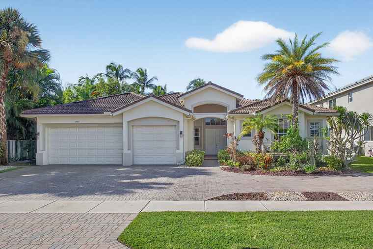 Photo of 11792 Osprey Pointe Cir Wellington, FL 33449