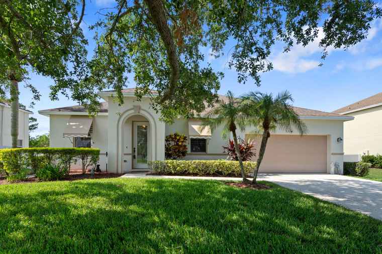 Photo of 5814 NW Windy Pines Ln Port Saint Lucie, FL 34986