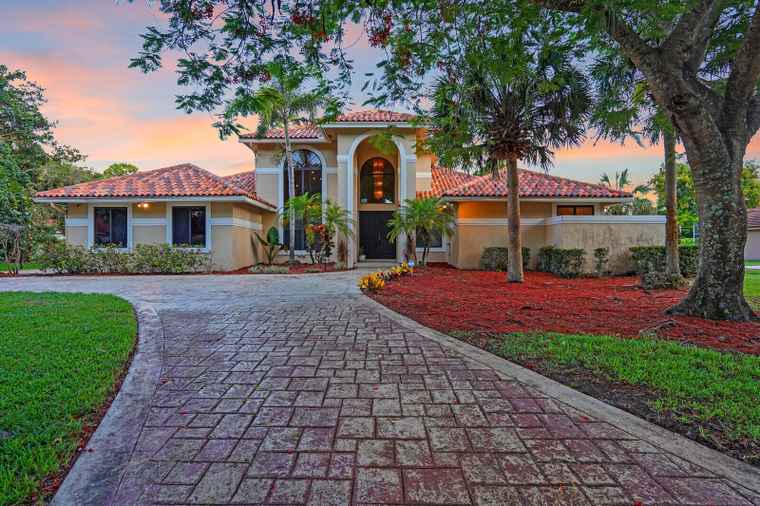 Photo of 6980 NW 67th Ct Parkland, FL 33067