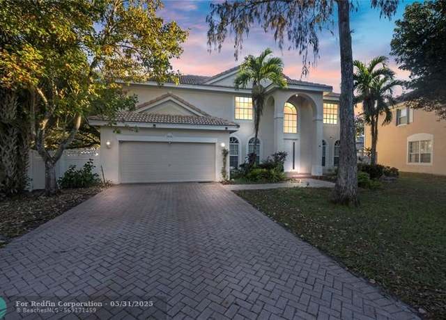 Property at 9526 NW 52nd Pl, Coral Springs, FL 33076, 5 beds, 3 baths