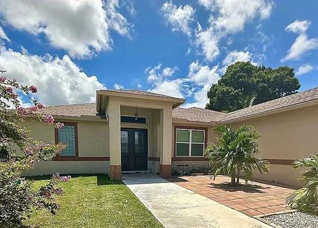 Property at 2544 SW Cameo Blvd, Port St. Lucie, FL 34953, 4 beds, 3 baths