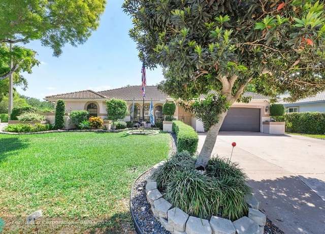 Property at 5197 NW 58th Ter, Coral Springs, FL 33067, 4 beds, 3 baths