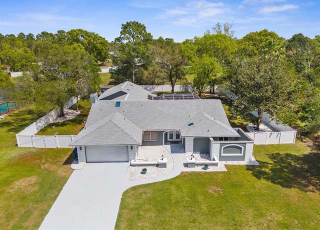 Property at 1156 Battersea Ave, FL 34609, 4 beds, 3.5 baths