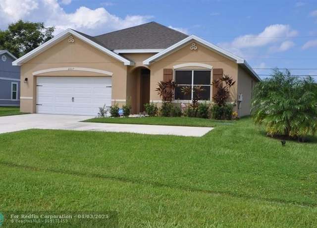 Property at 2257 SW Import Dr, Port St. Lucie, FL 34953, 4 beds, 2 baths