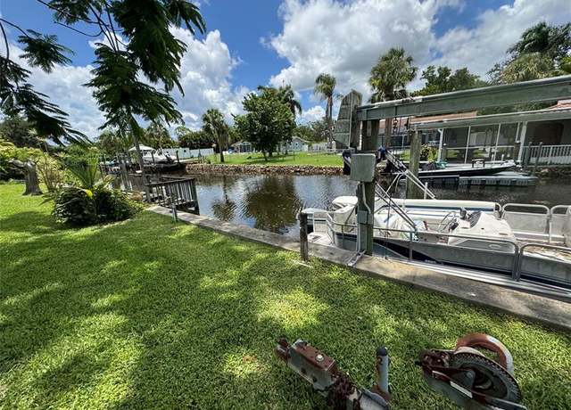 Property at 64 Wolcott Dr, FL 33903, 4 beds, 3 baths