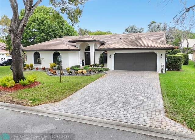 Property at 10027 NW 56th Ct, Coral Springs, FL 33076, 4 beds, 2.5 baths