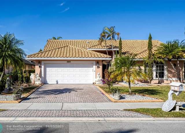 Property at 5044 NW 100th Ter, Coral Springs, FL 33076, 4 beds, 3 baths