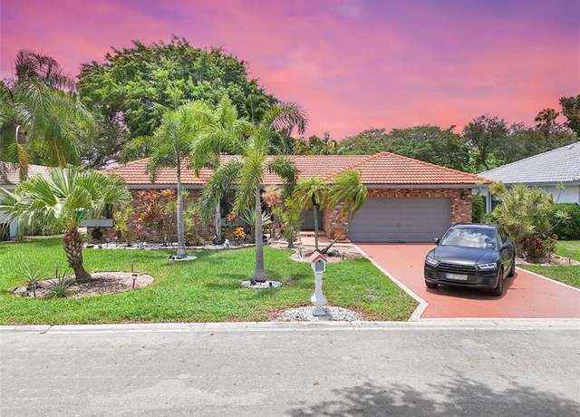 Property at 5180 NW 64th Dr, Coral Springs, FL 33067, 4 beds, 2 baths