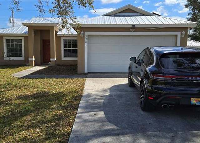 Property at 2201 SW Plymouth St, Port St. Lucie, FL 34953, 3 beds, 2 baths