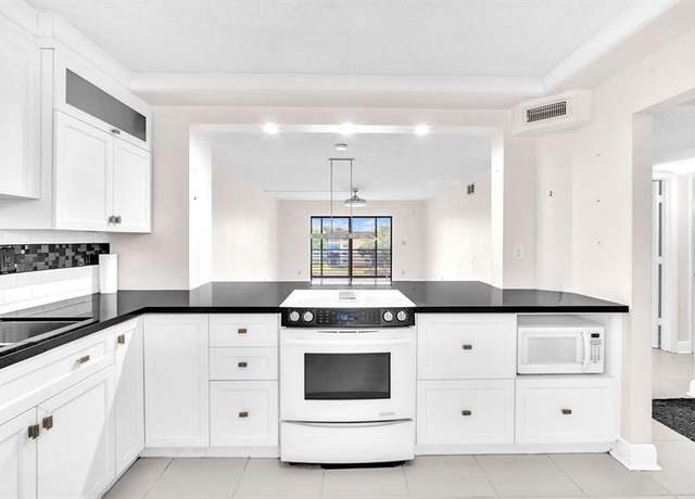 Property at 4930 E Sabal Palm Blvd #414, Tamarac, FL 33319, 2 beds, 2 baths