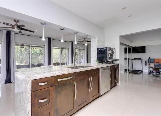 Property at 5500 Mulberry Dr, Tamarac, FL 33319, 3 beds, 3 baths