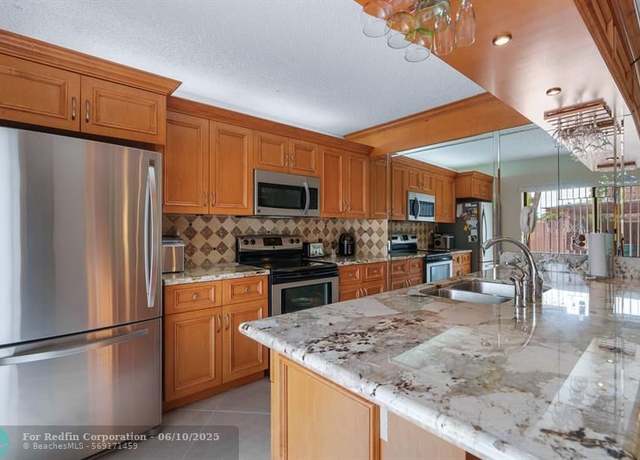 Property at 6021 NW 54th Ln, Tamarac, FL 33319, 3 beds, 2.5 baths
