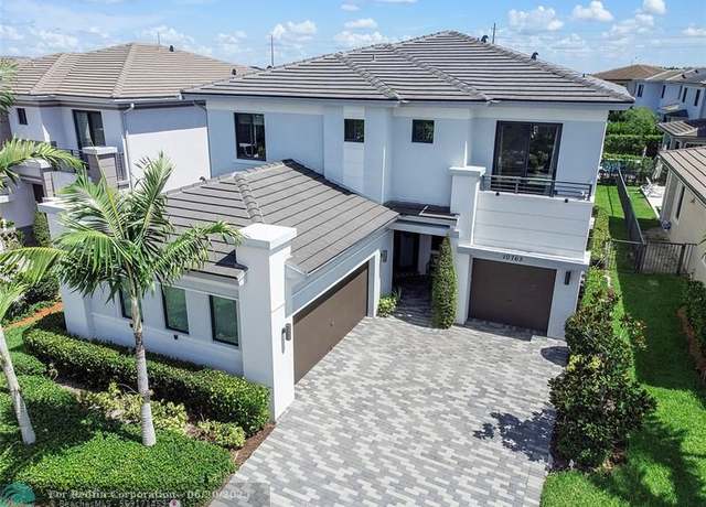 Property at 10765 Windward St, Parkland, FL 33076, 5 beds, 3.5 baths