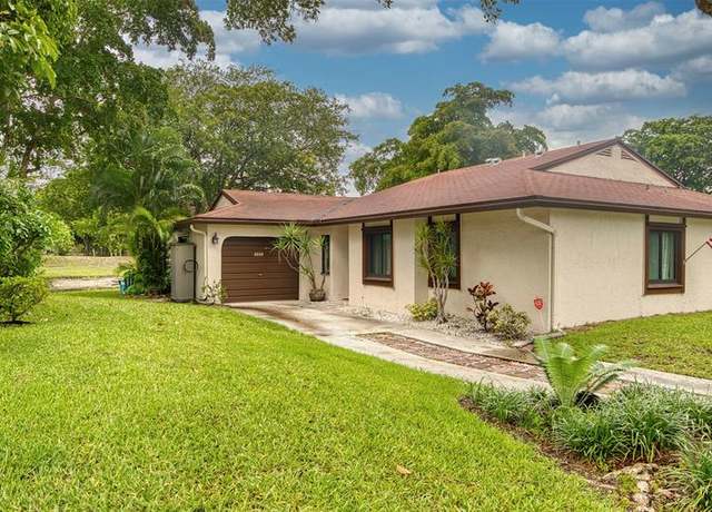 Property at 8000 NW 60th St, Tamarac, FL 33321, 3 beds, 2 baths