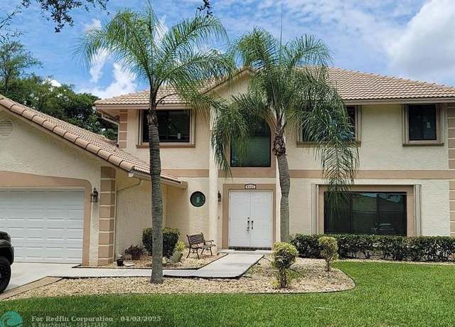 Property at 4931 NW 49th Ave, Coconut Creek, FL 33073, 4 beds, 2.5 baths
