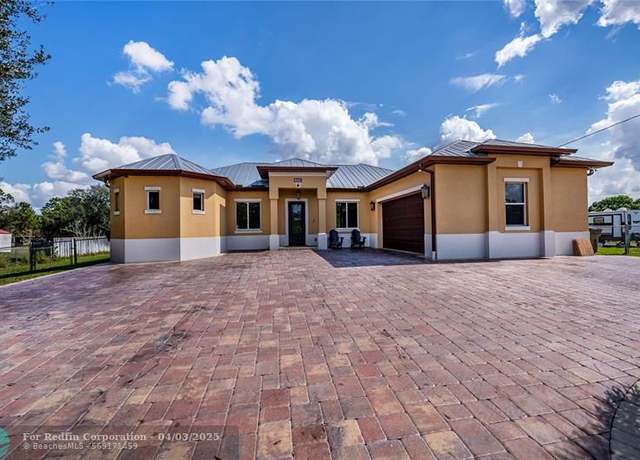 Property at 802 Poinsettia Ave, FL 33972, 3 beds, 2.5 baths