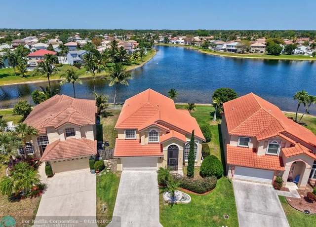 Property at 7445 Oakboro Dr, FL 33467, 4 beds, 3 baths