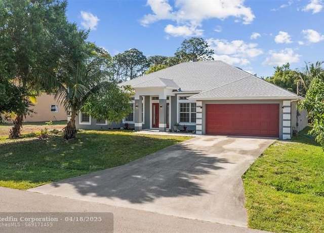 Property at 1218 SW Melrose Ave, Port St. Lucie, FL 34953, 4 beds, 3 baths