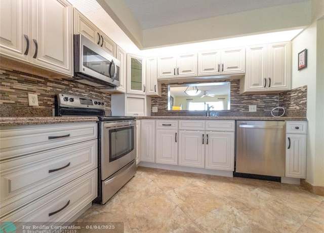 Property at 13100 SW 11th Ct Unit 405C, Pembroke Pines, FL 33027, 2 beds, 2 baths