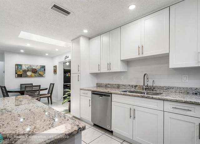 Property at 9404 NW 81st Ct, Tamarac, FL 33321, 3 beds, 2 baths