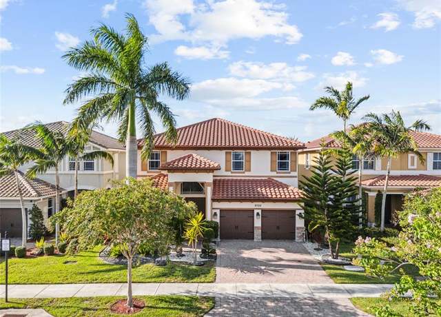 Property at 9725 Blue Isle Bay, Parkland, FL 33076, 5 beds, 4 baths