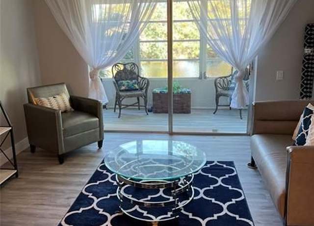Property at 9070 Lime Bay Blvd #209, Tamarac, FL 33321, 1 bed, 1.5 baths