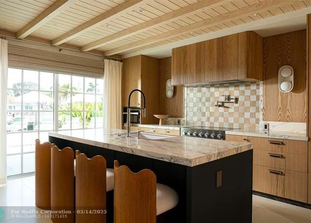 Property at 3061 NE 42nd St, Fort Lauderdale, FL 33308, 4 beds, 3.5 baths