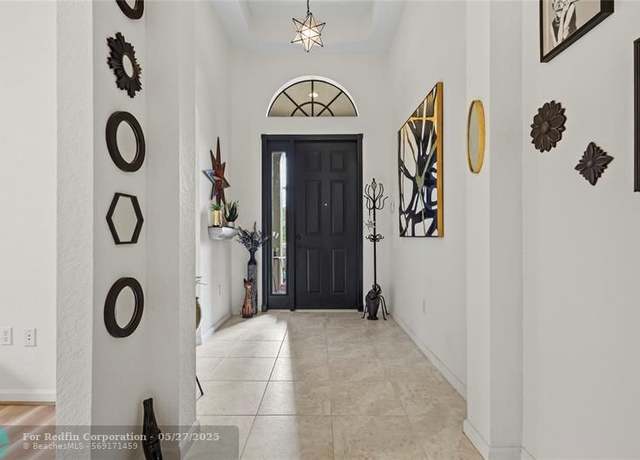 Property at 9744 Isles Cay Dr, Delray Beach, FL 33446, 3 beds, 2 baths