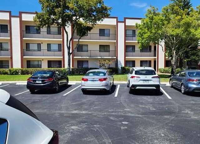 Property at 9655 N Belfort Cir #211, Tamarac, FL 33321, 2 beds, 2 baths