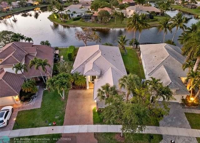 Property at 10979 NW 62nd Ct, Parkland, FL 33076, 3 beds, 2 baths