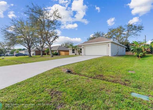 Property at 1658 SE Harp Ln, Port St. Lucie, FL 34983, 4 beds, 2 baths