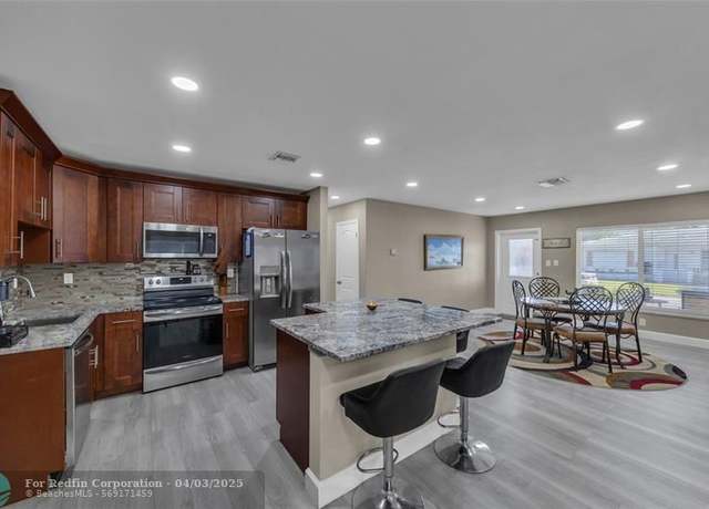 Property at 8207 NW 59th Ct, Tamarac, FL 33321, 3 beds, 2 baths