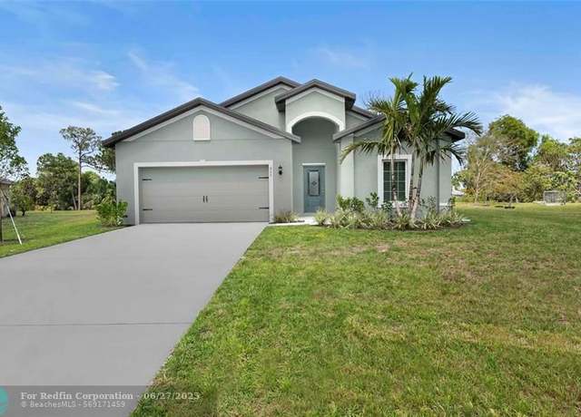 Property at 605 SE Delancey Ln, Port St. Lucie, FL 34984, 4 beds, 2 baths