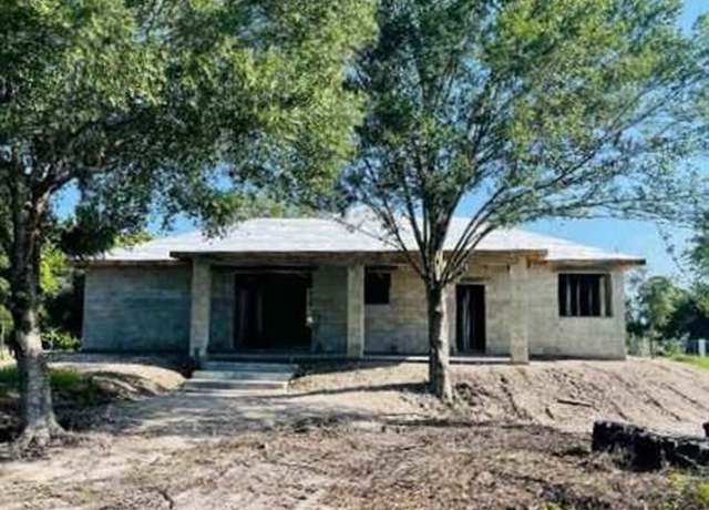 Property at 430 Bald Cypress Ave, FL 33440, 3 beds, 2 baths