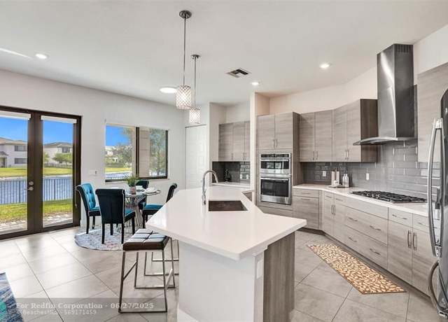 Property at 10480 Waves Way, Parkland, FL 33076, 4 beds, 3 baths