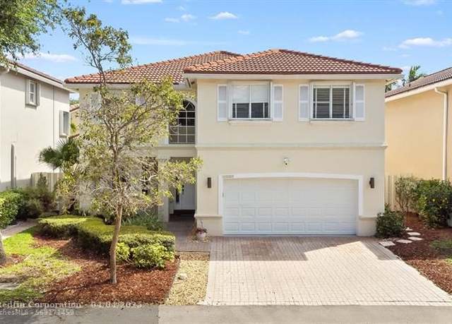 Property at 1080 Lyontree St, Hollywood, FL 33019, 4 beds, 2.5 baths
