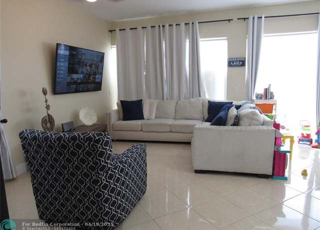 Property at 11963 Glenmore Dr, Coral Springs, FL 33071, 4 beds, 2.5 baths