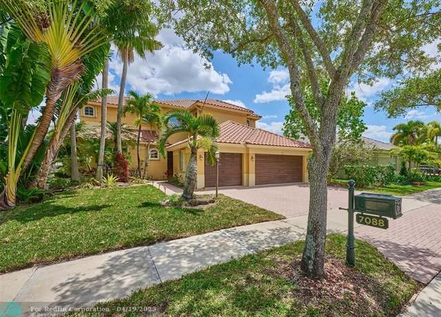 Property at 7088 NW 111th Ter, Parkland, FL 33076, 5 beds, 3.5 baths