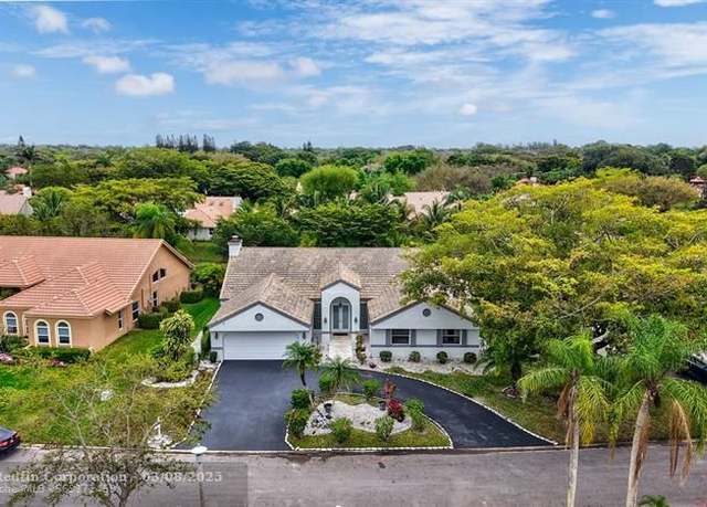 Property at 5001 NW 84th Rd, Coral Springs, FL 33067, 4 beds, 3.5 baths