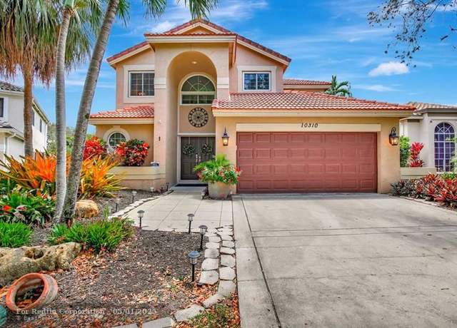 Property at 10310 Santiago St, Hollywood, FL 33026, 4 beds, 2.5 baths