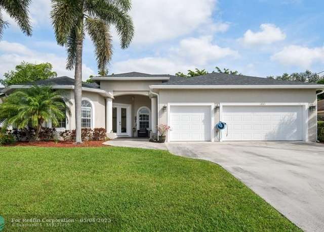 Property at 355 SW De Gouvea Ter, Port St. Lucie, FL 34984, 4 beds, 3 baths
