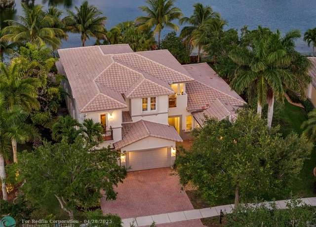 Property at 7898 NW 111th Way, Parkland, FL 33076, 7 beds, 5 baths