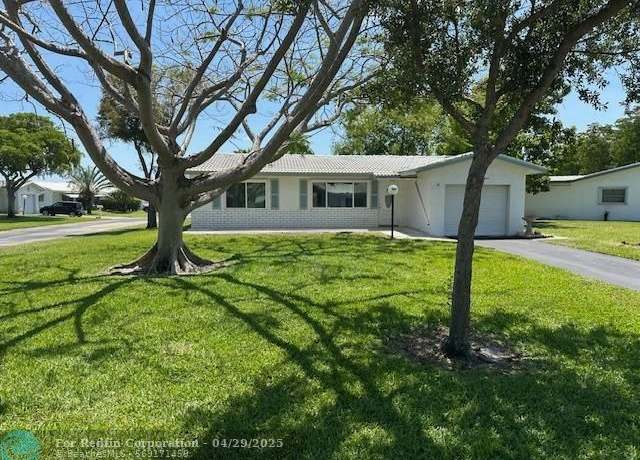 Property at 8604 N Campanelli Blvd, Fort Lauderdale, FL 33322, 3 beds, 2 baths